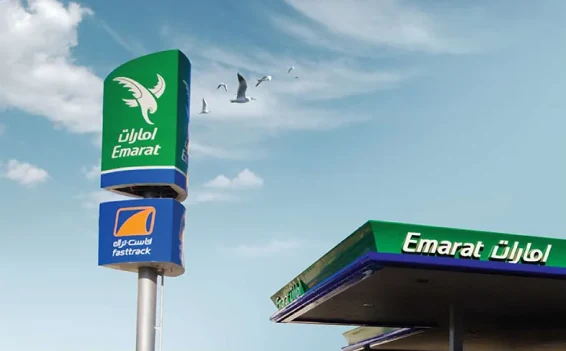 A FastTrack service point on an Emarat fuel forecourt, with the FastTrack sign under the Emarat pylon